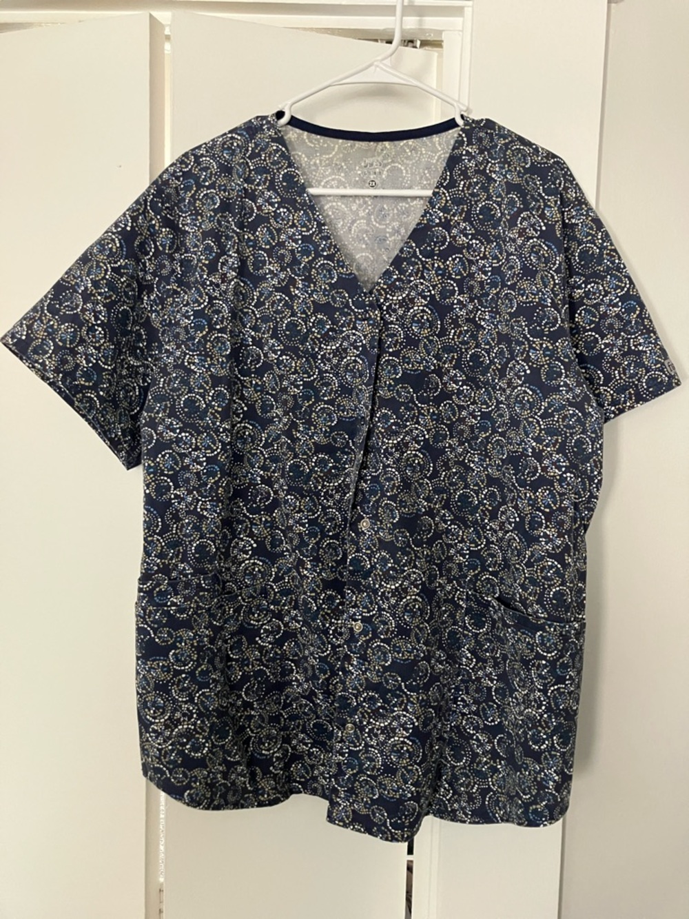 Woman’s Navy Floral Pattern Button Down V-Neck Scrub Top